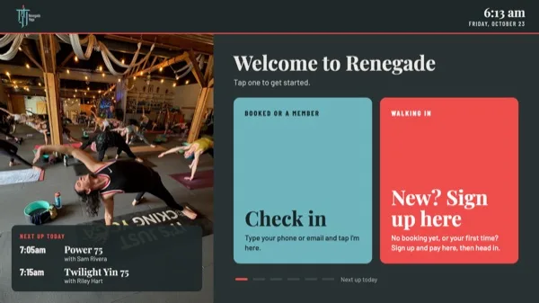 The lobby kiosk welcome screen with Check in and New? Sign up here buttons